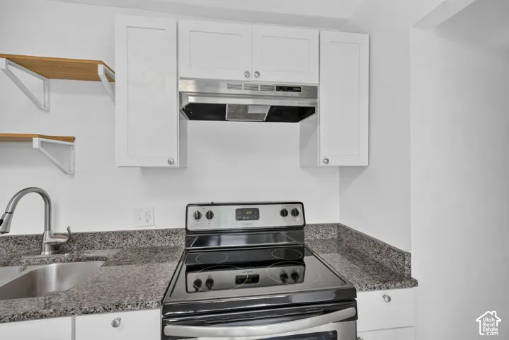 Updated kitchen with granite countertops and fresh paint