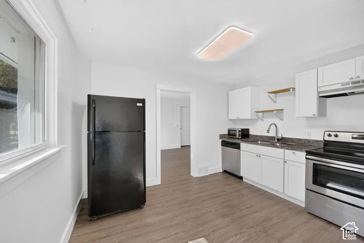 Updated kitchen with granite countertops and fresh paint