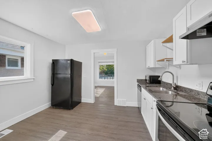 Updated kitchen with granite countertops and fresh paint