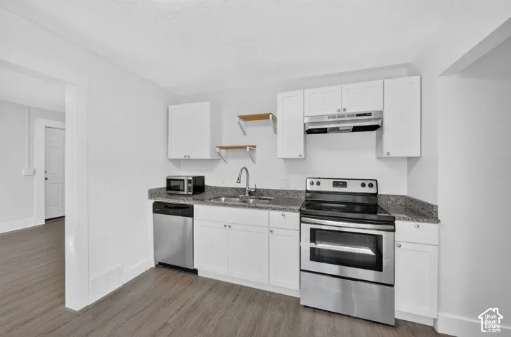 Updated kitchen with granite countertops and fresh paint