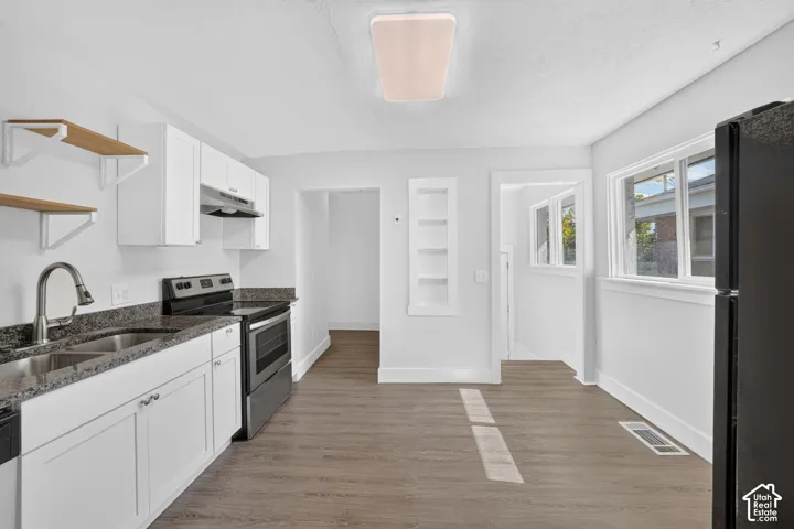 Updated kitchen with granite countertops and fresh paint
