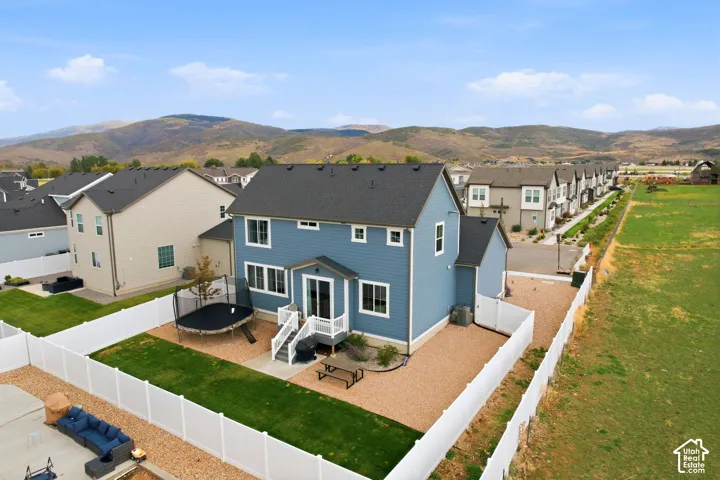 Blue siding exterior with white trim