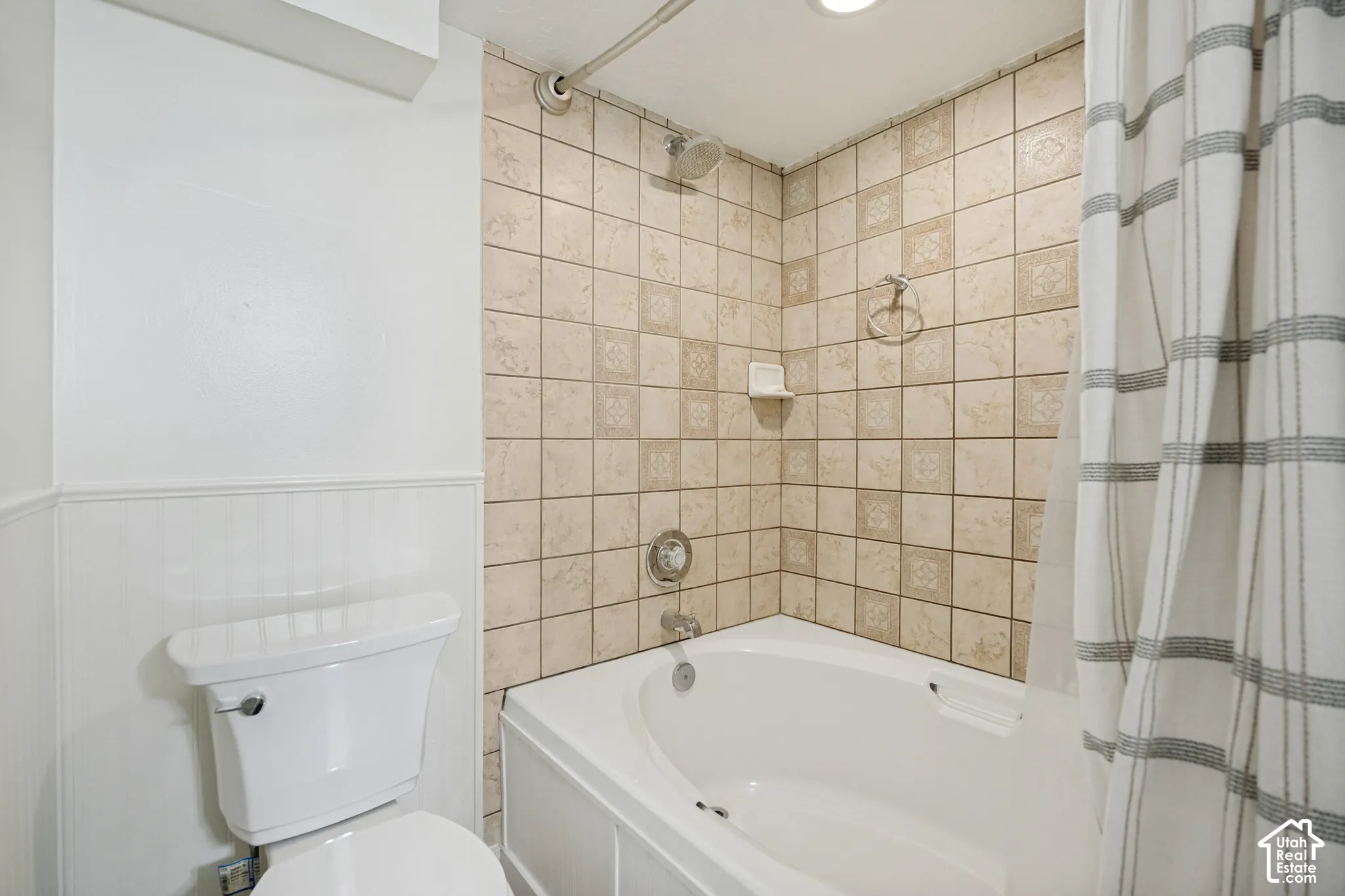 Full basement bathroom with dual vanities