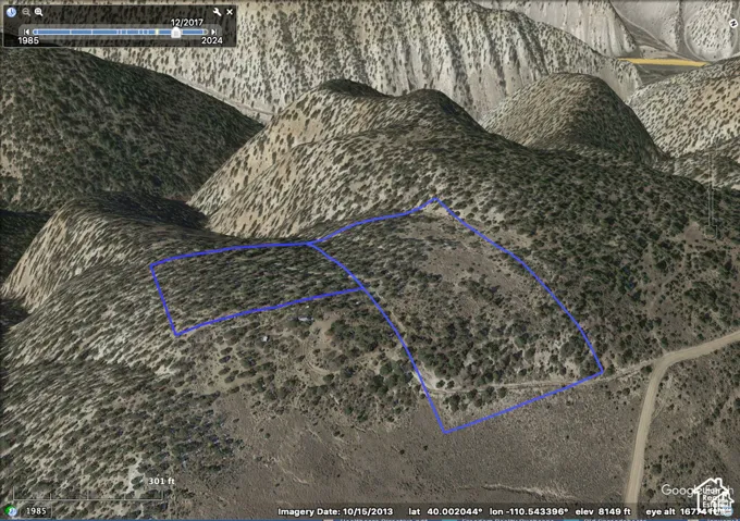 Satellite Imagery. Displaying an overhead perspective of the property with boundary outlines
