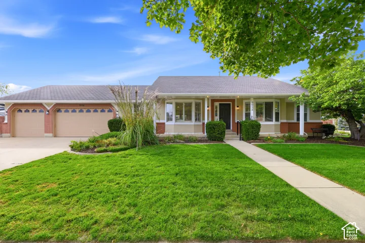 Spacious front yard with mature landscaping