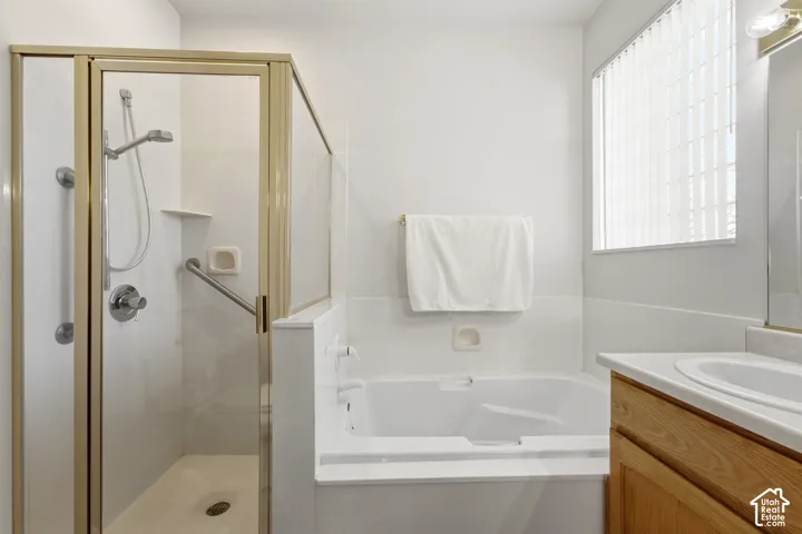 Primary en suite with separate tub and shower - with built in shelf and grab bar