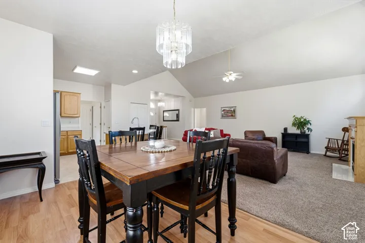 Wood-finish flooring, vaulted ceilings, and a ceiling fan