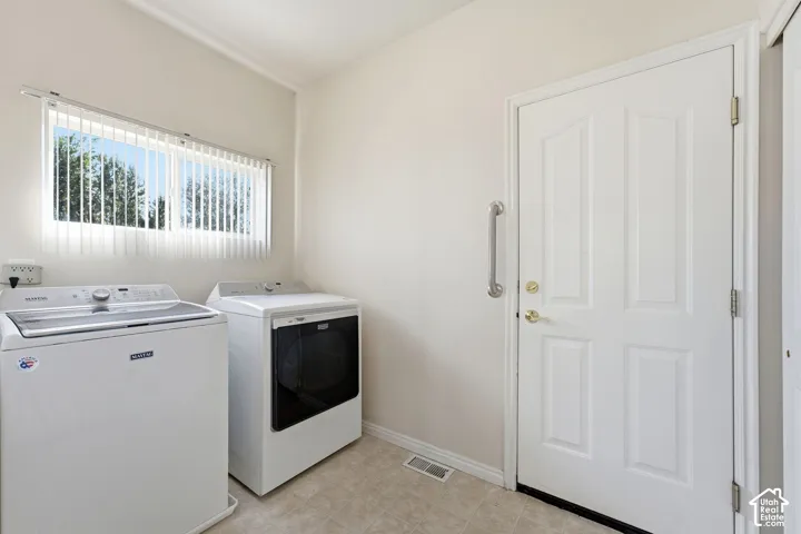 Main floor laundry with storage