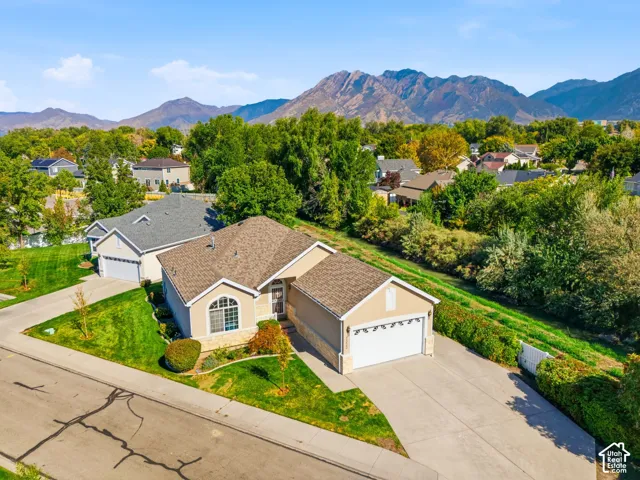 Aerial view showing neighbor on only one corner of home.