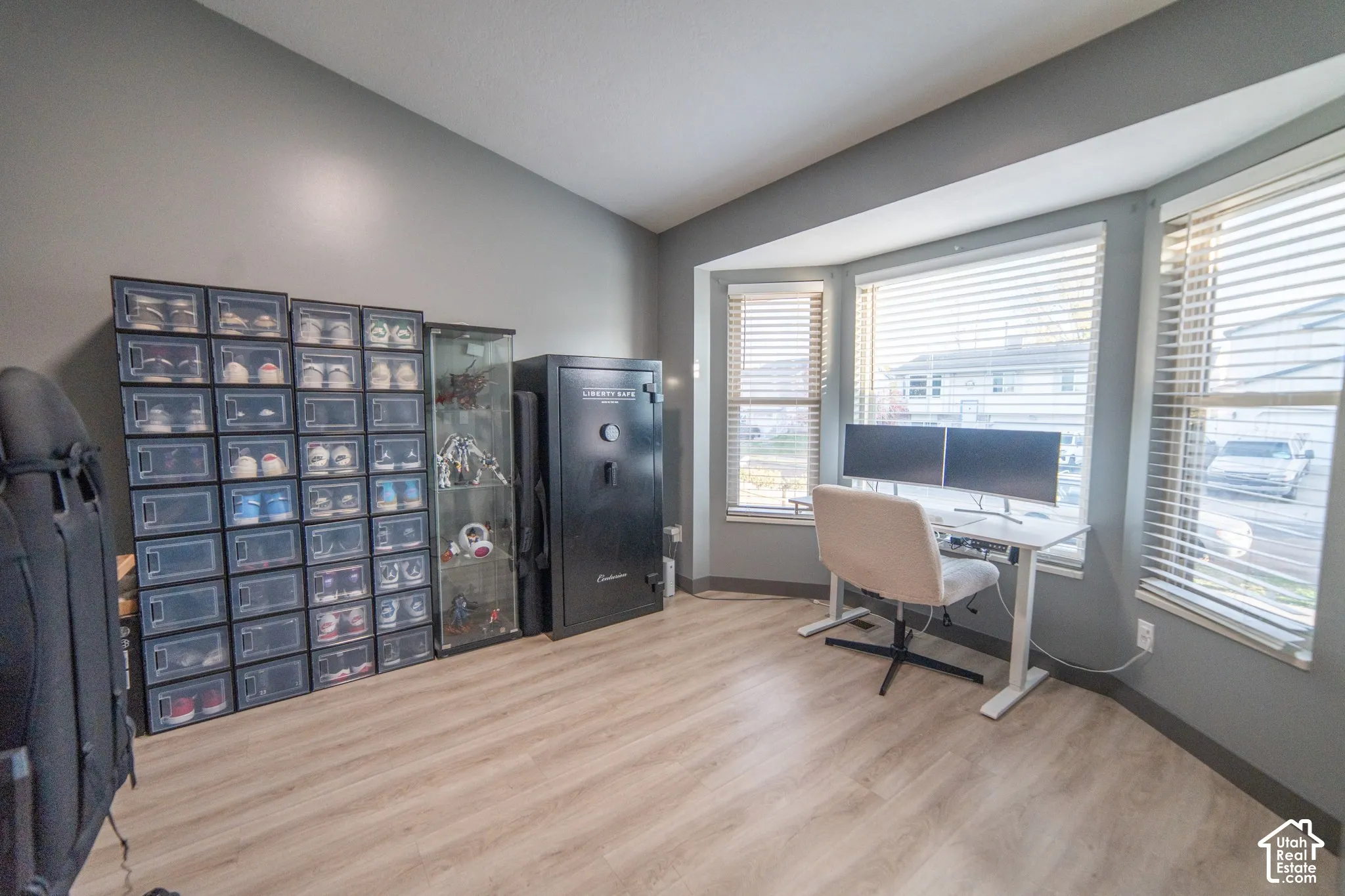Light wood-finish flooring with neutral wall paint