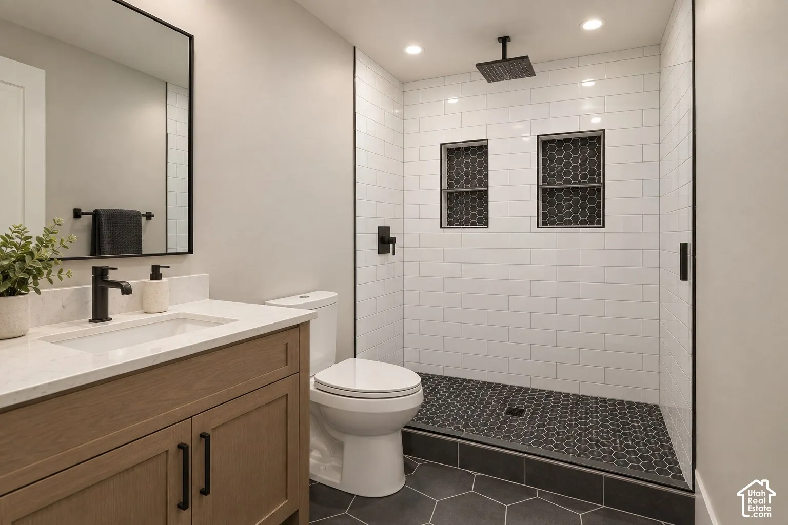 Digitally altered image: bathroom shown virtually finished. Seller will have the basement bathroom finished before closing.