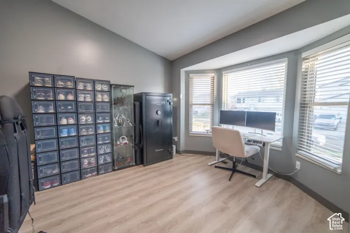 Light wood-finish flooring with neutral wall paint
