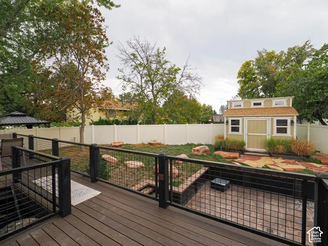 Composite deck with metal railings