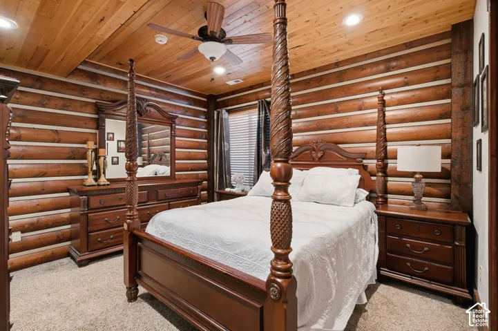 Log-style wall paneling and a wood-paneled ceiling