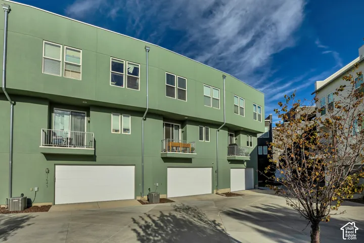 Contemporary multi-story exterior with a flat roofline