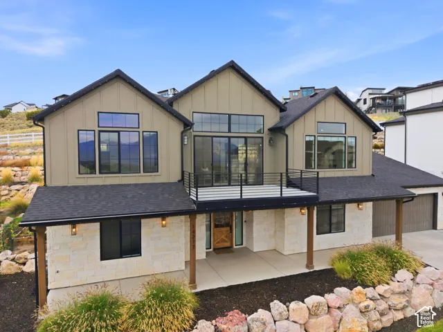 Drone view showing off the deck.  Wait until you see the views!