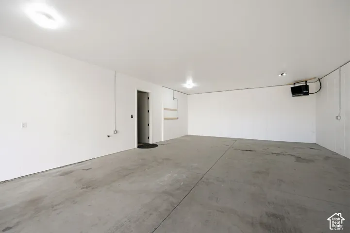 Deep 4 car garage with heating and 250V 50amp EV charger