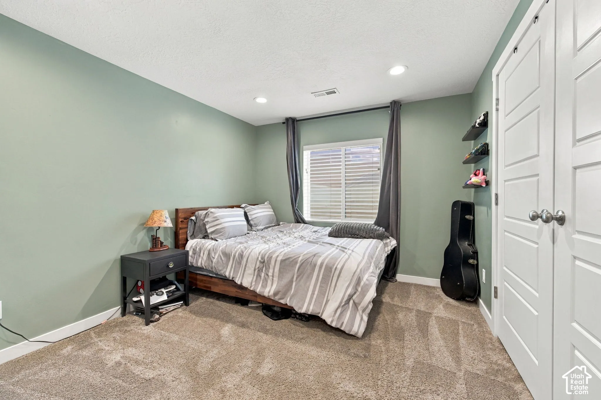 Bedroom 6 - Recessed ceiling lighting, textured wall finish, and a window with horizontal blinds