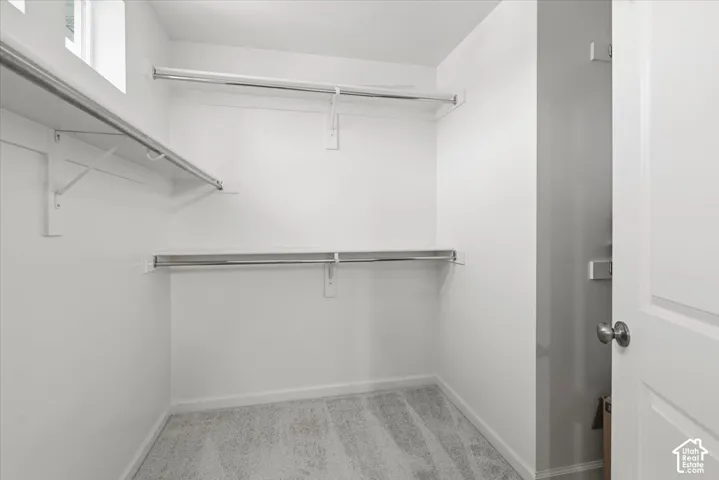 White walls with light gray carpeting