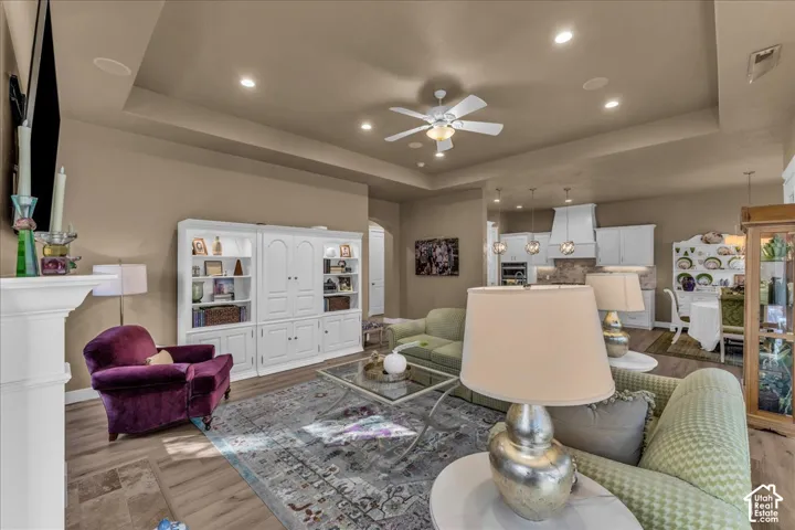 Tray ceiling with recessed lighting and a ceiling fan