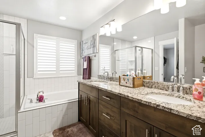 Double vanity with granite countertops and undermount sinks