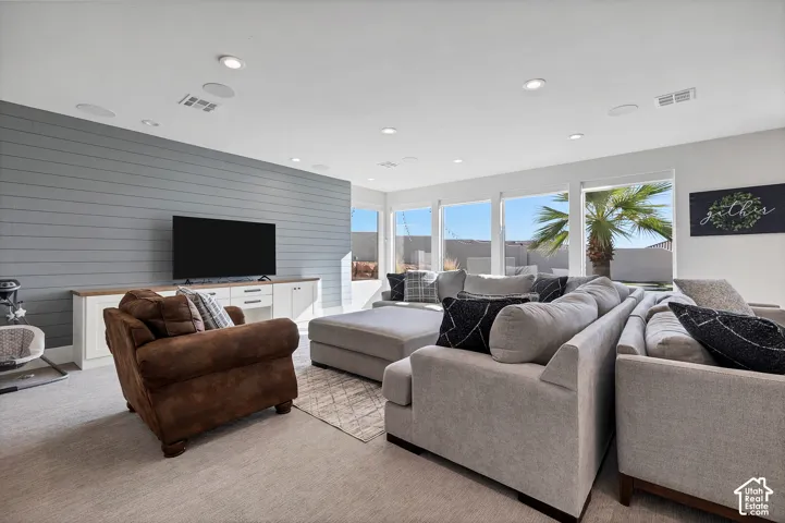 Built-in entertainment console with a wood-finish countertop