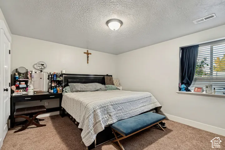 Basement Bedroom 1 with daylight window.