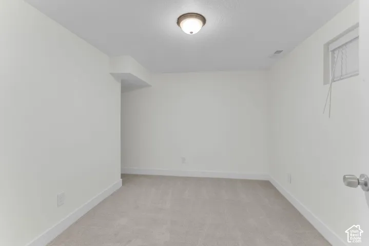 Neutral-toned wall-to-wall carpeting