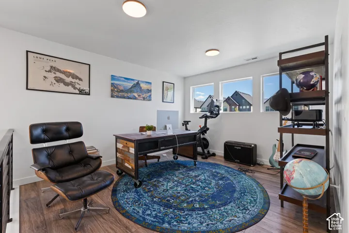 Wood-finish flooring throughout