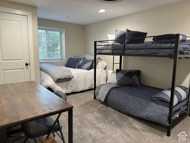 Wall-to-wall carpeting and neutral wall tones