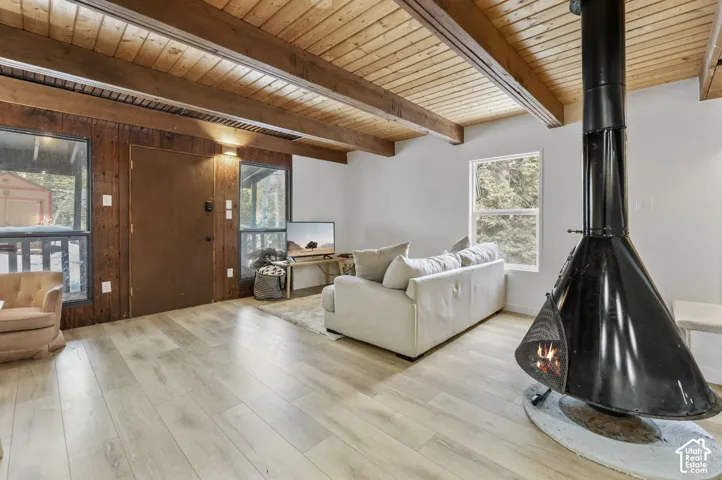 Vaulted wood-paneled ceiling with exposed beams