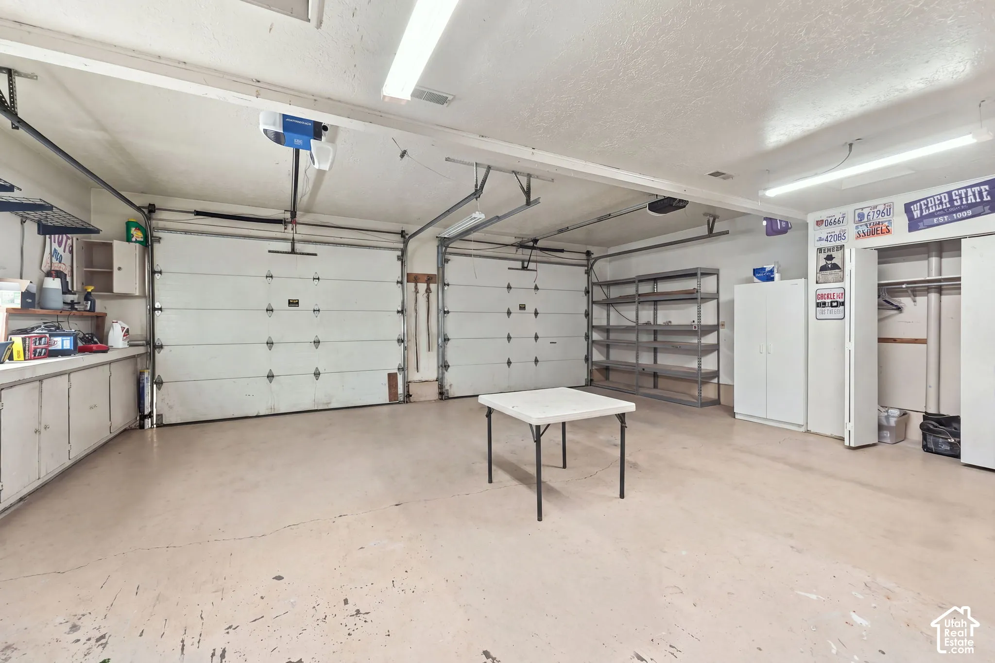 Two overhead garage doors with automatic openers