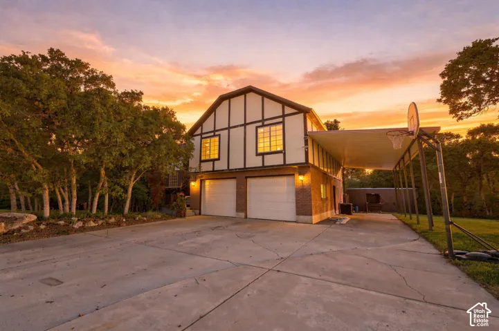 Tudor-style exterior with decorative half-timbering and brick accents