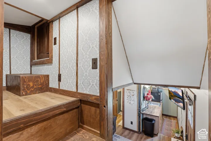 Wood-finish flooring, wood paneling, and patterned wall covering