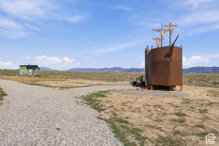 Gravel driveway with two distinct structures