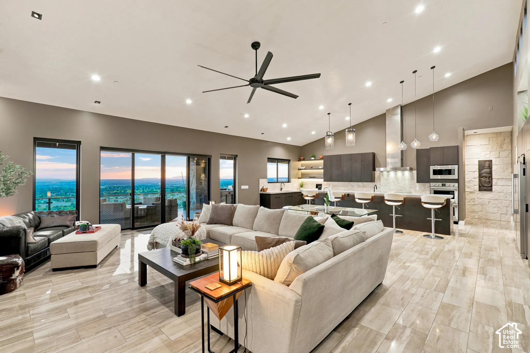 Expansive great room with vaulted ceilings and recessed lighting