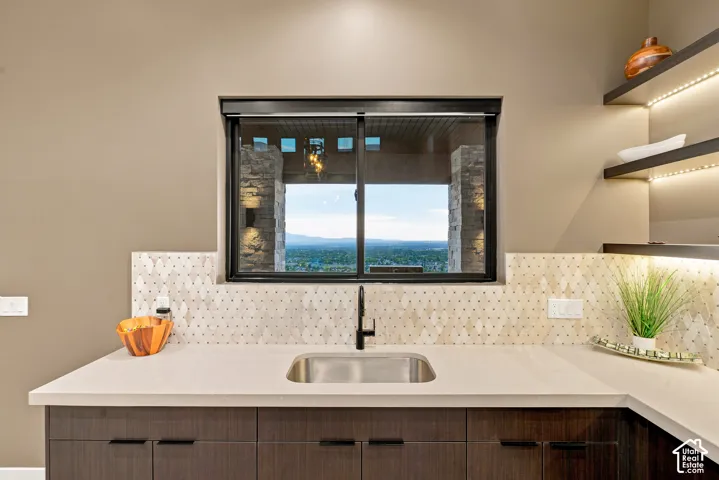 Integrated stainless steel sink with matte black faucet