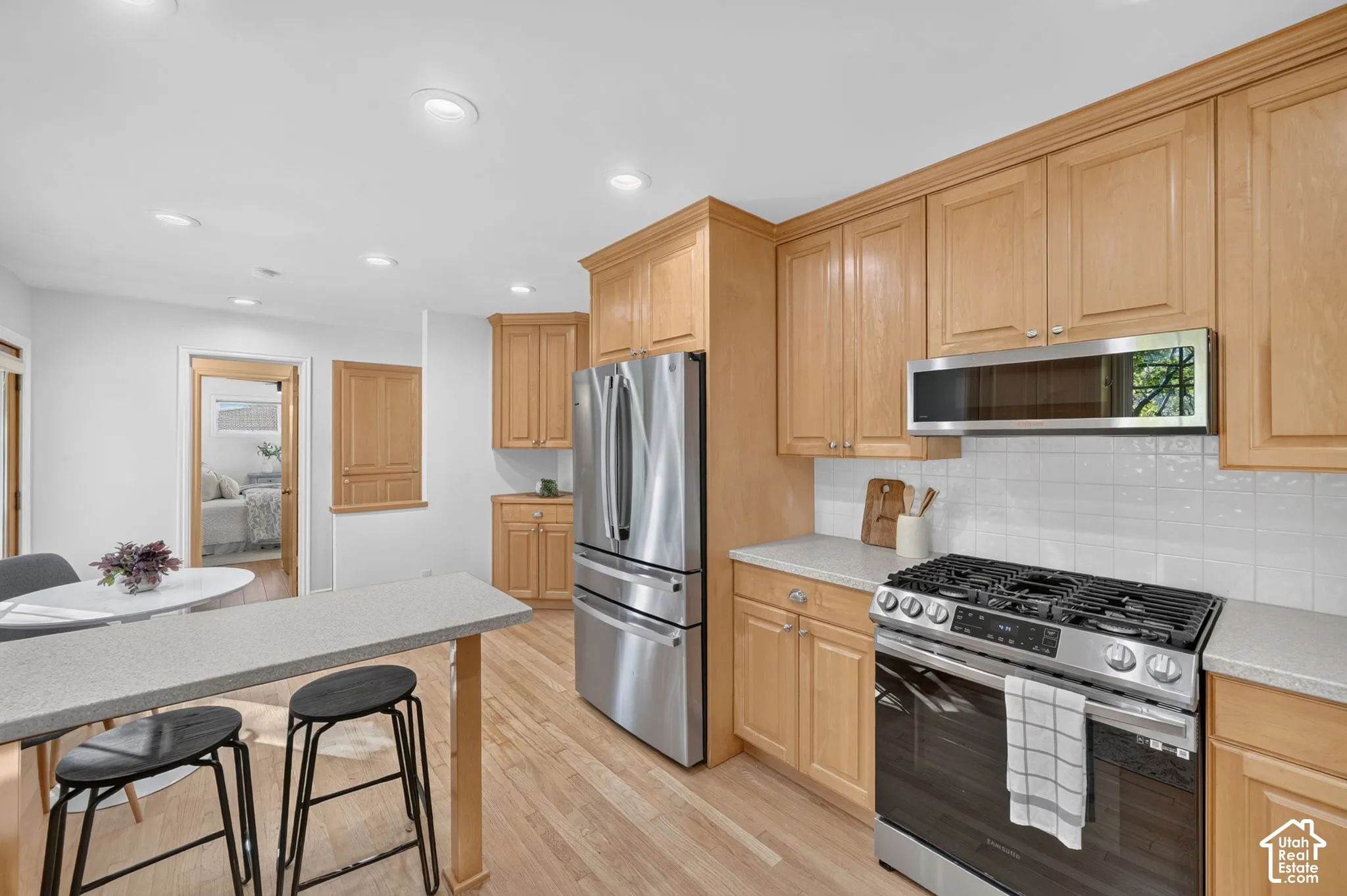 Kitchen opening toward the main-floor bedrooms.
