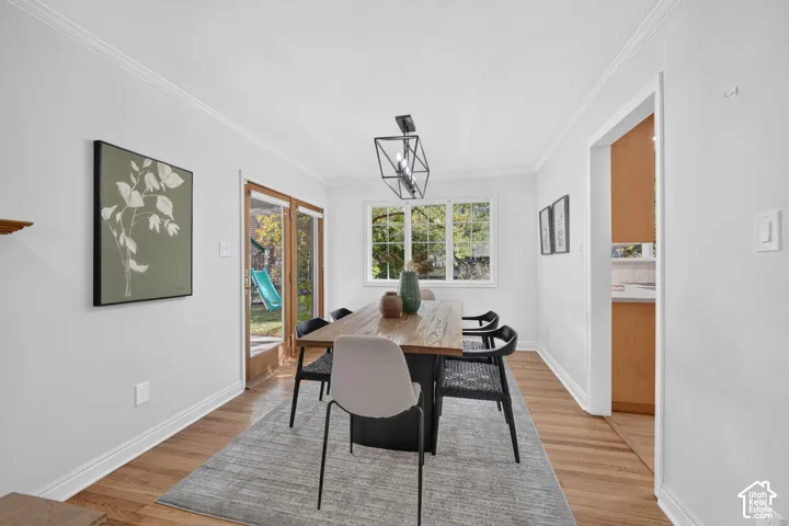 Dining room with a glass door to the backyard.