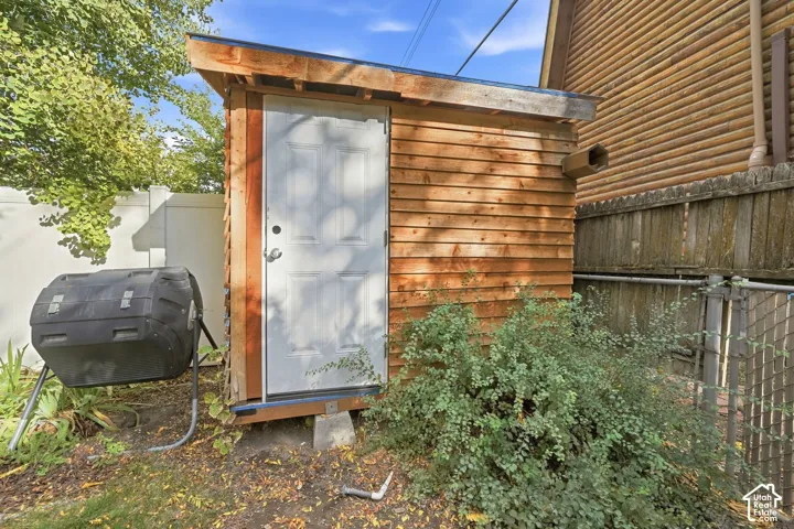 Backyard storage shed and composter.