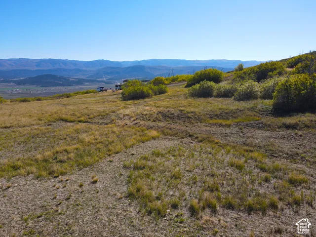 Expansive elevated lot with a distant mountain backdrop