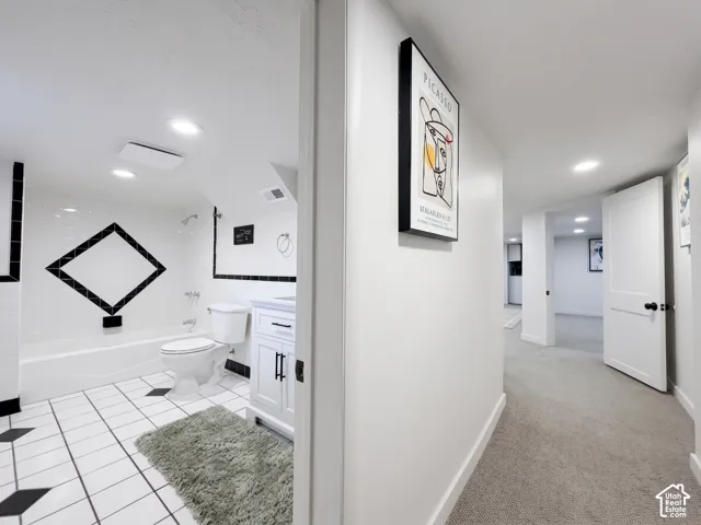 Convenient full bathroom in basement apartment area.