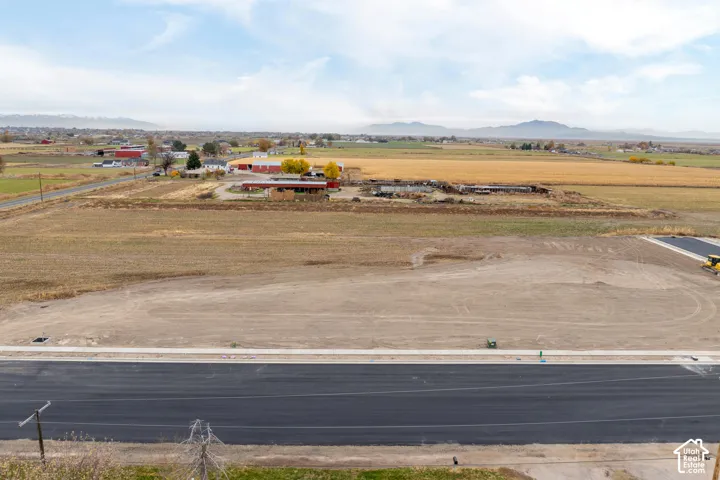 Expansive undeveloped parcel with a newly paved road