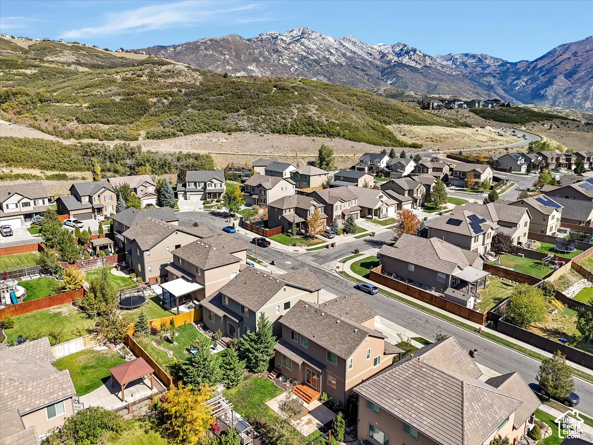 Mountain backdrop community with mature landscaping and established residential streets