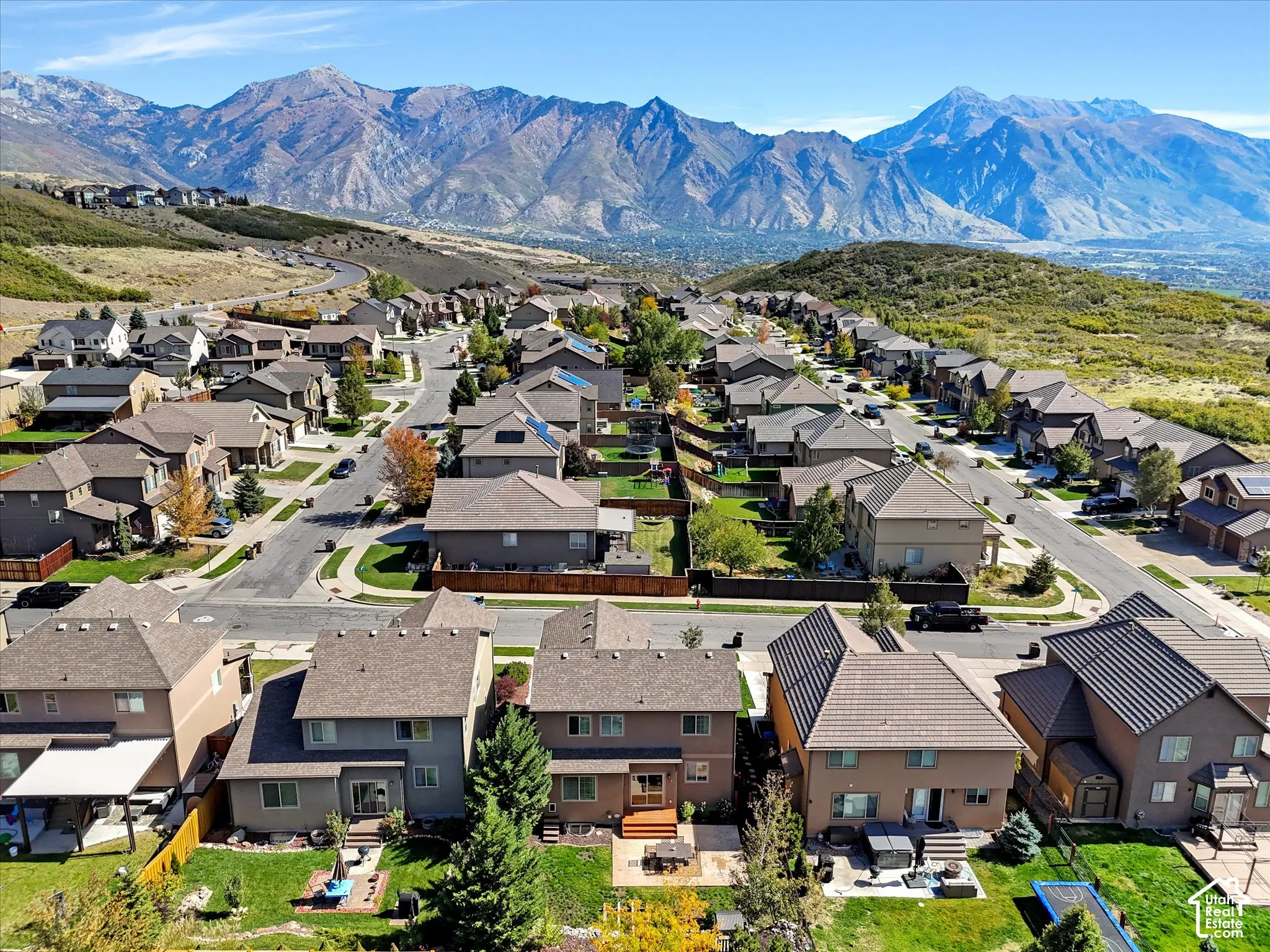 Established residential community nestled against dramatic mountain backdrop