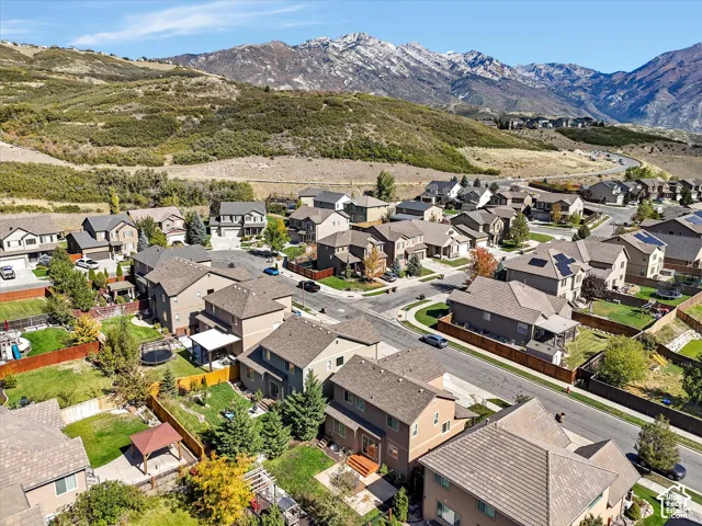 Mountain backdrop community with mature landscaping and established residential streets