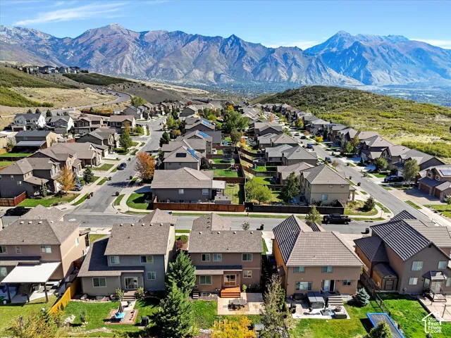 Established residential community nestled against dramatic mountain backdrop