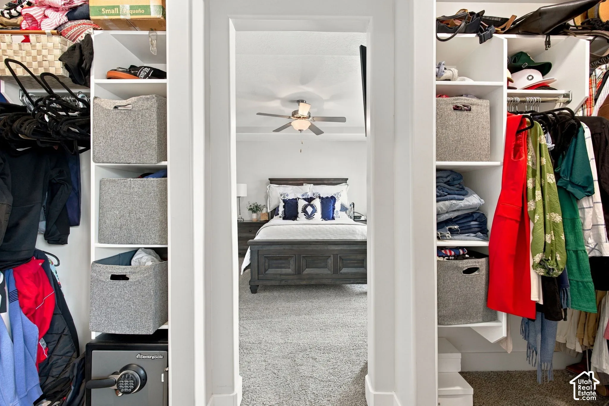 Two built-in closet systems with shelving and hanging rods