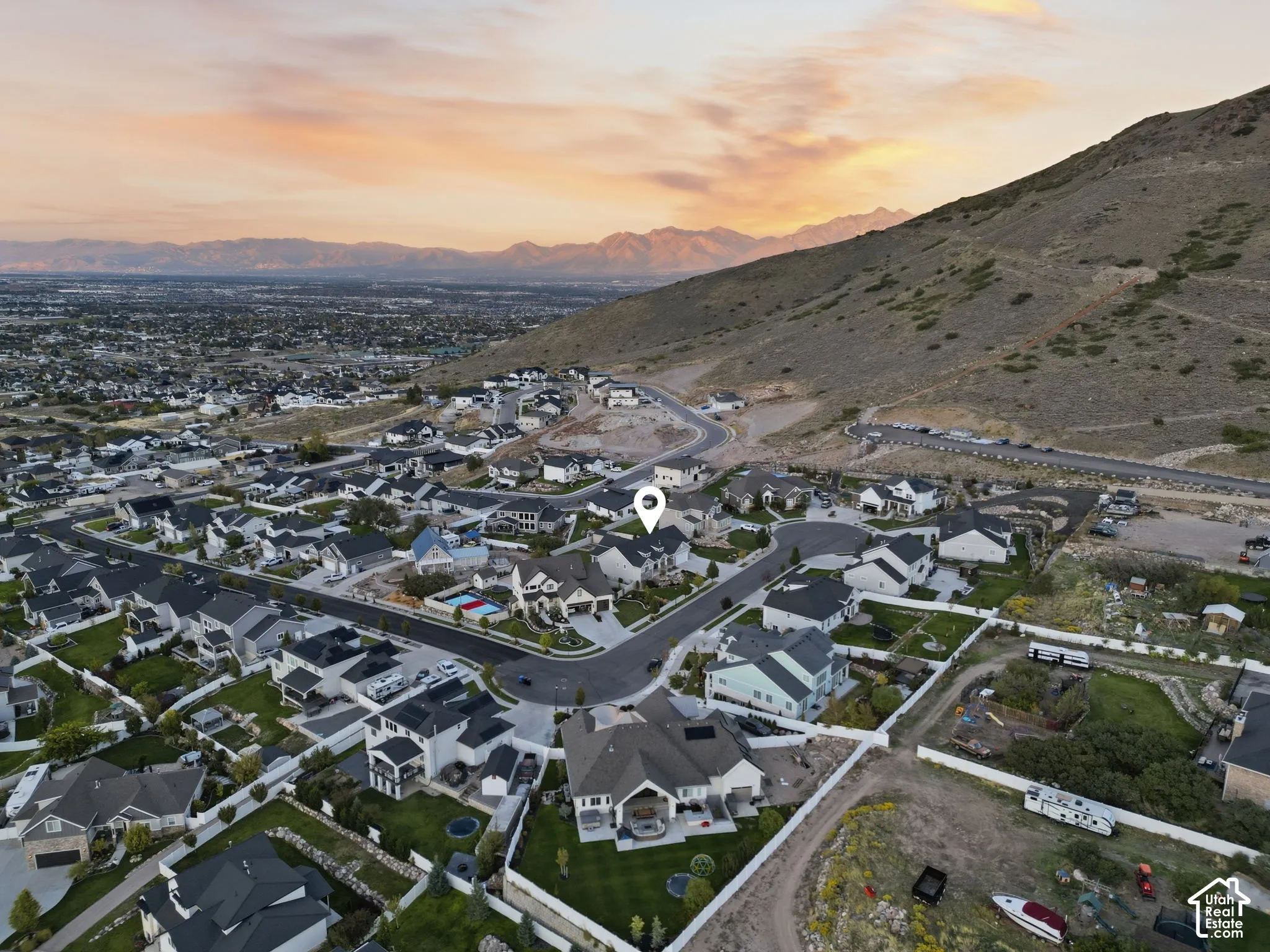 Expansive neighborhood with a backdrop of distant mountains