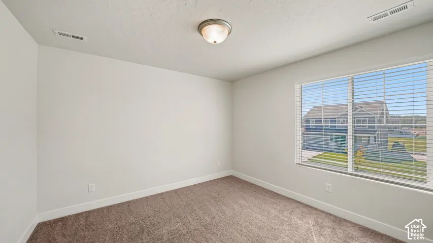 BEDROOM 3 W WALK-IN CLOSET & VIEWS